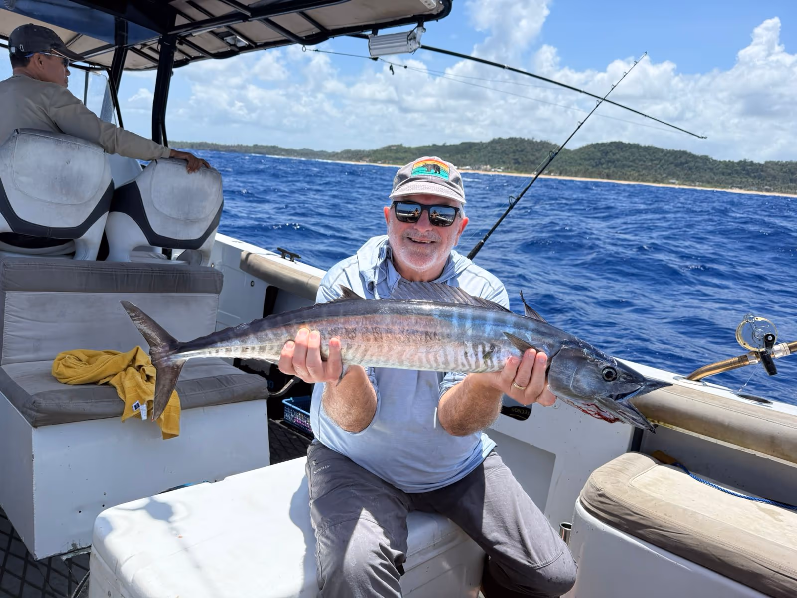 Anglers on the water during a Patrick's fishing charter in Siargao