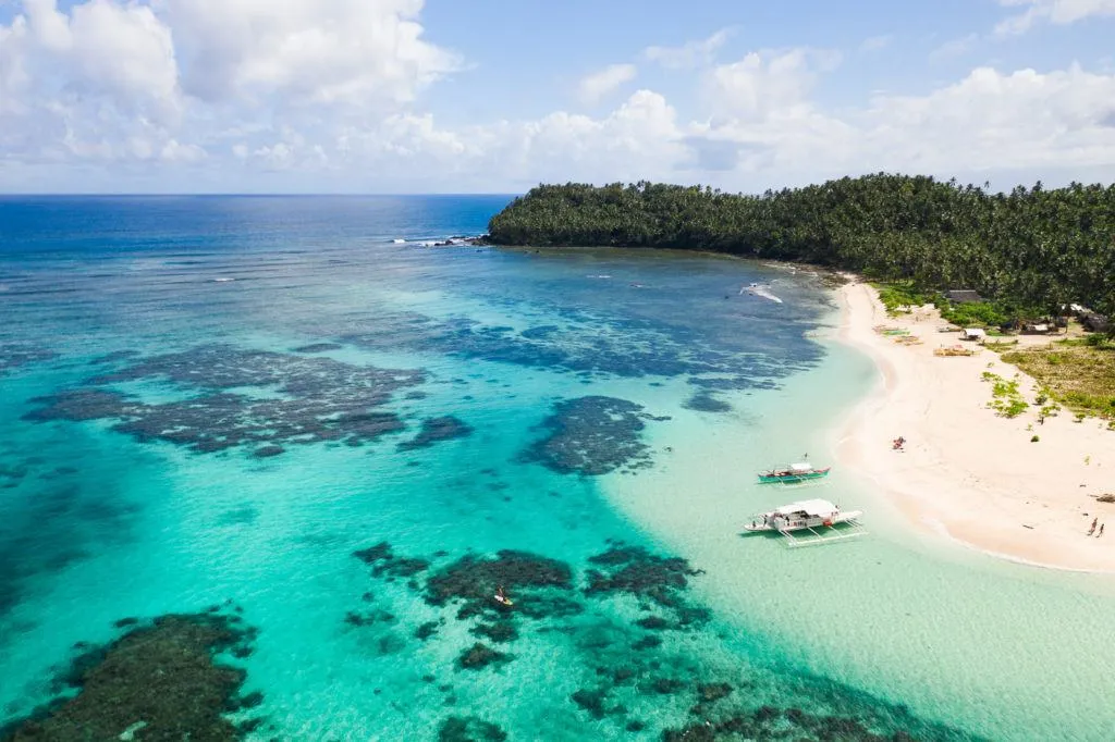 Powder white sand beach on La Janoza Island near Siargao