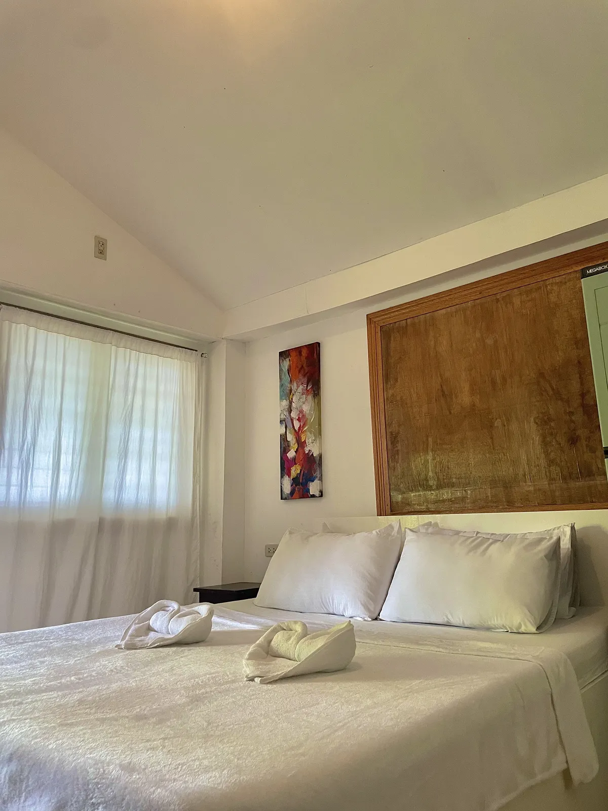 Bedroom of the Deluxe Beachfront Cottage at Patrick's on the Beach, Siargao
