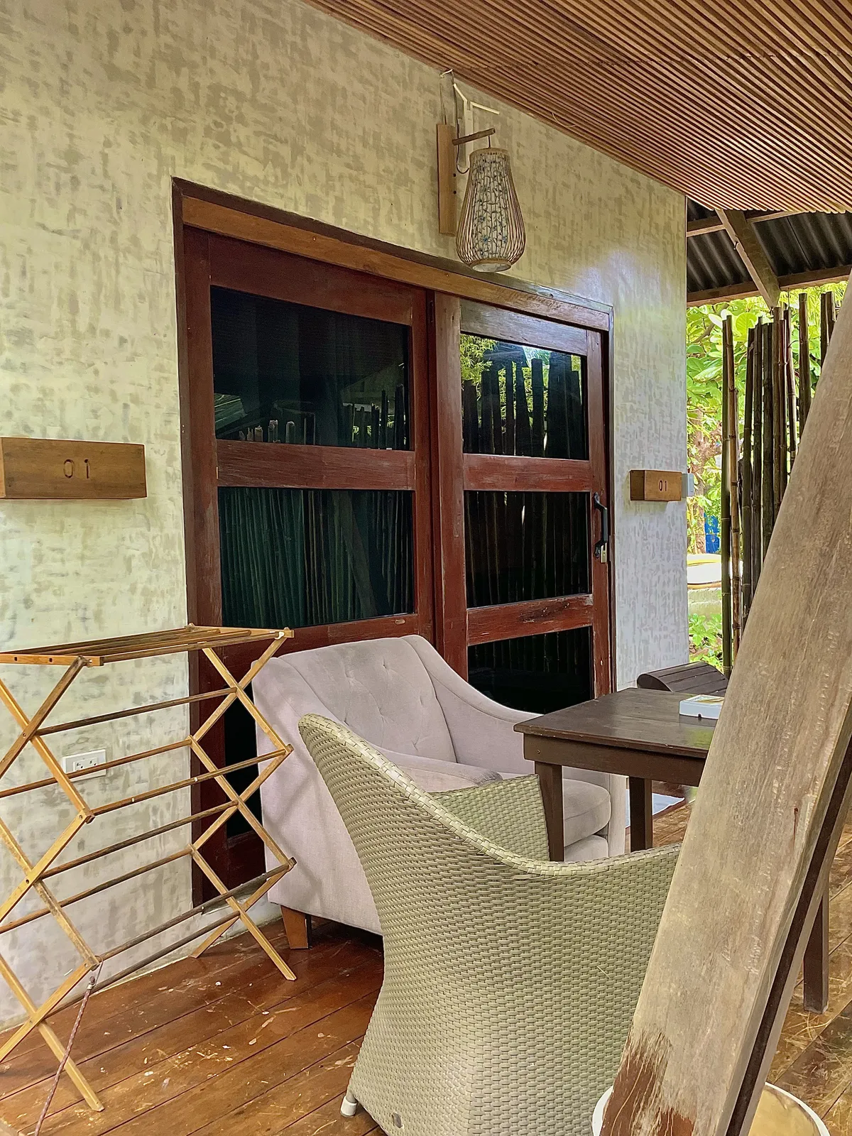 Private porch of the Tropical Beachfront Villa overlooking the gardens at Patrick's on the Beach, Siargao